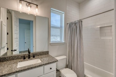 Experience luxury living in this stunning custom single-level