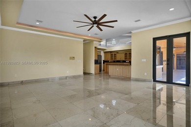 This stunning property features high-polished marble floors - photo 17