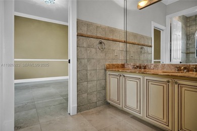This stunning property features high-polished marble floors - photo 26