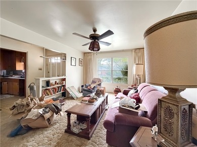 3-bedroom, 2-bath estate brimming with potential and ready for - photo 6