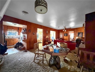 3-bedroom, 2-bath estate brimming with potential and ready for - photo 9