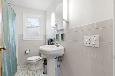Welcome to this charming 4-bedroom 1.5 bath just yards away from - photo 27