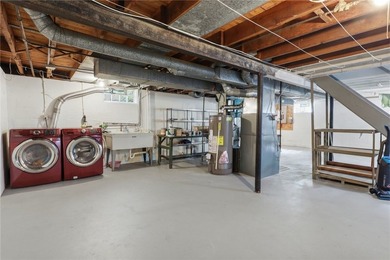 Welcome to this charming 4-bedroom 1.5 bath just yards away from - photo 28