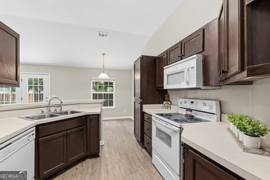 Welcome home to this sweet 3-bedroom, 2-bathroom home located in - photo 14