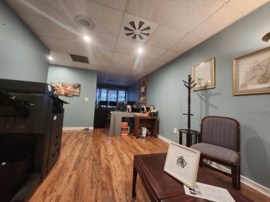 Well-appointed 943 SF first floor office condominium. Efficient