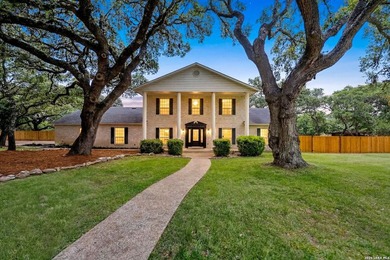 Set on a full acre in the exclusive gated community of Raintree - photo 1