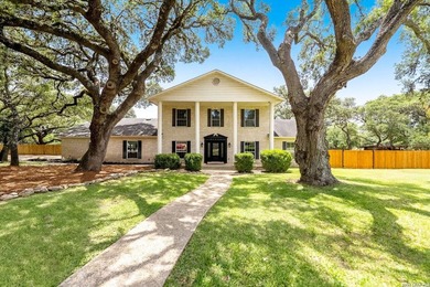 Set on a full acre in the exclusive gated community of Raintree - photo 2