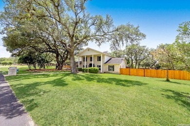 Set on a full acre in the exclusive gated community of Raintree - photo 3