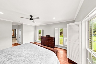 Set on a full acre in the exclusive gated community of Raintree - photo 9
