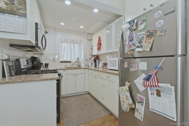 Spacious and bright one-bedroom co-op in Smith Harbor featuring