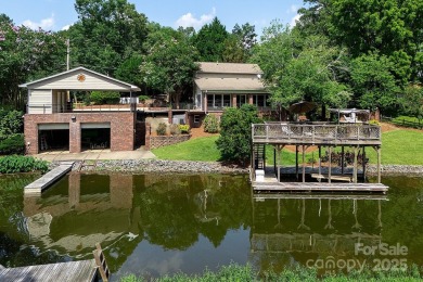 Just off the main channel of Lake Tillery, this private custom - Lake Home For Sale in Albemarle, North Carolina