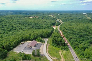 This expansive 5-acre commercial lot boasts exceptional frontage - photo 2