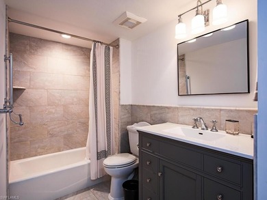Experience the pinnacle of coastal living in this turnkey - photo 12