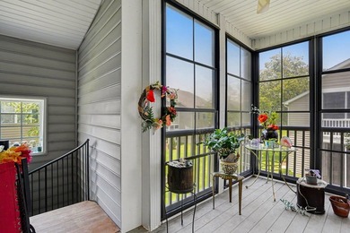 Welcome to this delightful three-bedroom, two-bathroom end unit - photo 26