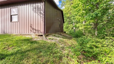 Welcome to 15 acres with over 400 feet of calm waterfront. This - photo 49