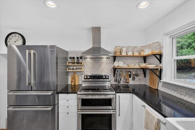 Nestled on a spacious double lot of just over half an acre, this - photo 19