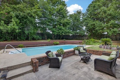 Nestled on a spacious double lot of just over half an acre, this - photo 40