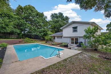 Nestled on a spacious double lot of just over half an acre, this - photo 41