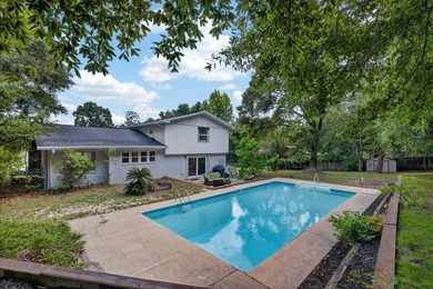 Nestled on a spacious double lot of just over half an acre, this - photo 42