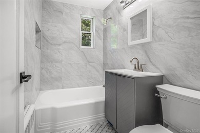 Beautifully renovated 1-bedroom lower-level unit in the - photo 11