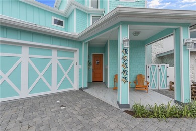 Experience coastal luxury reimagined at 13505 Port Royal Ct in