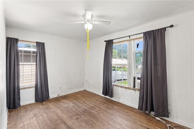 This two-bedroom, one-bath property presents a solid opportunity - photo 12