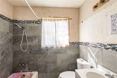 This two-bedroom, one-bath property presents a solid opportunity - photo 13