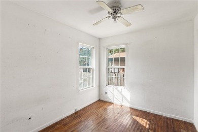This two-bedroom, one-bath property presents a solid opportunity - photo 14