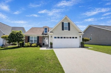 Welcome to this well-maintained three-bedroom home with a - photo 1