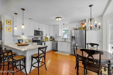 Welcome to this well-maintained three-bedroom home with a - photo 3