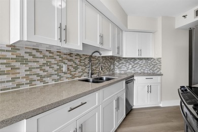 BEAUTIFUL, TOTALLY RENOVATED 2/2 IN DESIRABLE PORTSVIEW AT THE