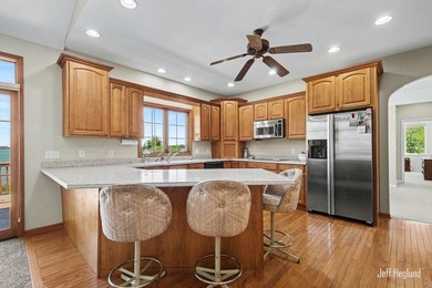This immaculate, custom-built Gun Lake home is being offered for - photo 13