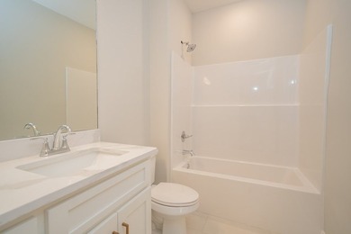 Popular Douglas A plan with 3 main level beds & 2 full baths! - photo 18