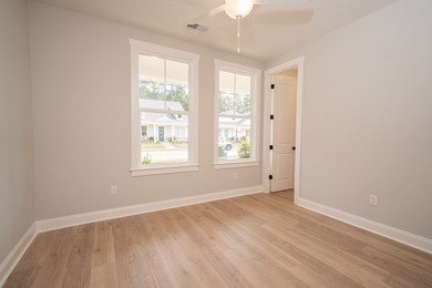 Popular Douglas A plan with 3 main level beds & 2 full baths! - photo 19