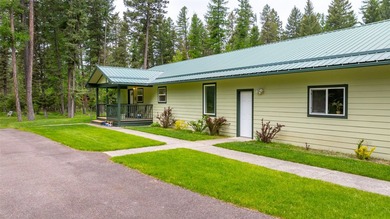 Nestled among the Larch and Douglas Fir Trees sits this charming - photo 3