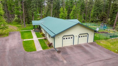 Nestled among the Larch and Douglas Fir Trees sits this charming - photo 5