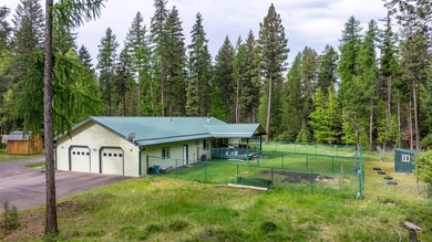 Nestled among the Larch and Douglas Fir Trees sits this charming - photo 7