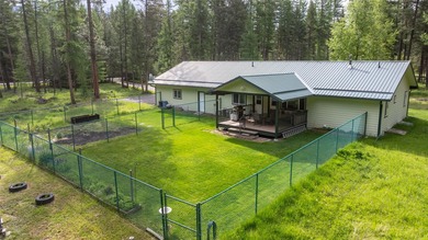 Nestled among the Larch and Douglas Fir Trees sits this charming - photo 9