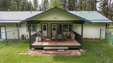 Nestled among the Larch and Douglas Fir Trees sits this charming - photo 10