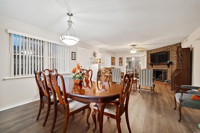 This spacious ground level condo has NO STAIRS.  New flooring in