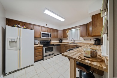 This spacious ground level condo has NO STAIRS.  New flooring in