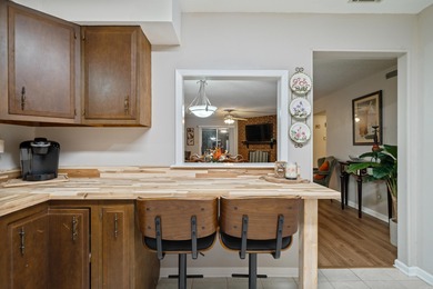 This spacious ground level condo has NO STAIRS.  New flooring in