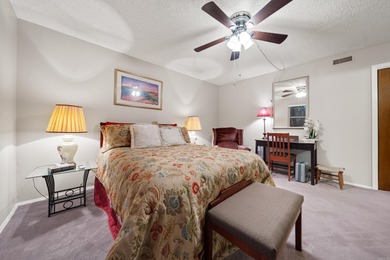 This spacious ground level condo has NO STAIRS.  New flooring in