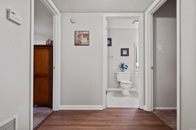 This spacious ground level condo has NO STAIRS.  New flooring in