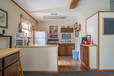 This spacious ground level condo has NO STAIRS.  New flooring in