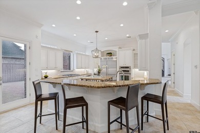 Situated in the prestigious gated community of The Lakes on - photo 12
