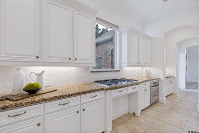 Situated in the prestigious gated community of The Lakes on - photo 13