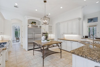 Situated in the prestigious gated community of The Lakes on - photo 14