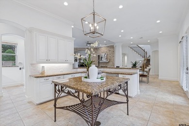 Situated in the prestigious gated community of The Lakes on - photo 15