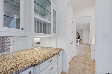Situated in the prestigious gated community of The Lakes on - photo 16